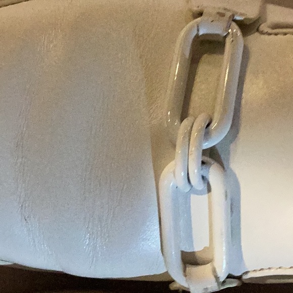 Very nice soft leather lightly worn Michael Kors white leather shoes with chain. - Picture 10 of 10